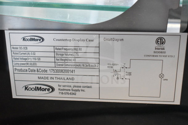 KoolMore DC-3CB commercial glass bakery display case label, showing model info, voltage, frequency, dimensions, and origin.