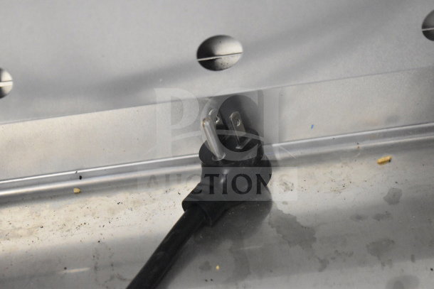 Power plug of 2019 True T-23F-HC commercial freezer, showing the three-prong design, suitable for 115 volts, 1 phase.