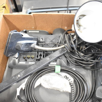 Box of six various office items including a corded telephone, flexible desk lamp, and assorted cables. Mixed condition.