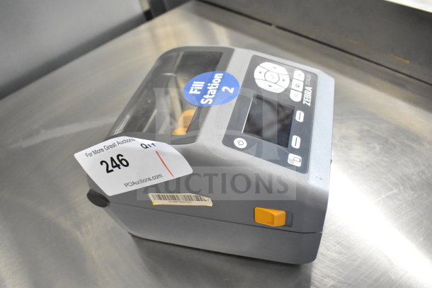 Zebra ZD620 desktop direct thermal barcode printer, good condition, with control panel and auction label visible.