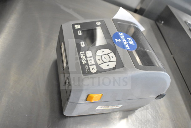 Zebra ZD620 desktop direct thermal barcode printer in good condition, with control buttons and model label visible.