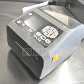 Zebra ZD620 desktop direct thermal barcode printer in excellent condition, featuring intuitive control panel and clear display.