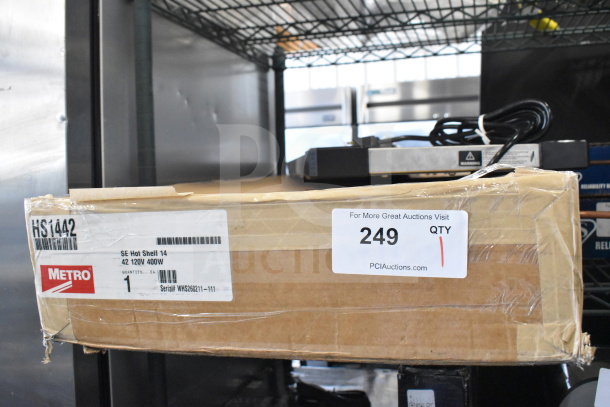 BRAND NEW Metro Super Erecta Hot HS1442 14"x42" stainless steel heated shelf, 120V, 1 Phase, with minor dents.