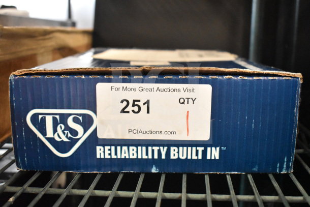 Box of T&S B-0221 deck mounted faucet, 12" swing nozzle, 8" centers, 18.39 GPM, Eterna cartridges, lever handles, new condition.