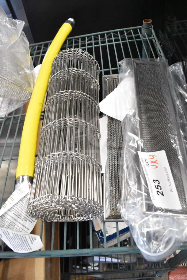 4 new items: Alto-Shaam 5024003 side vector air filter, conveyor belt, hose. Includes tags with auction details.