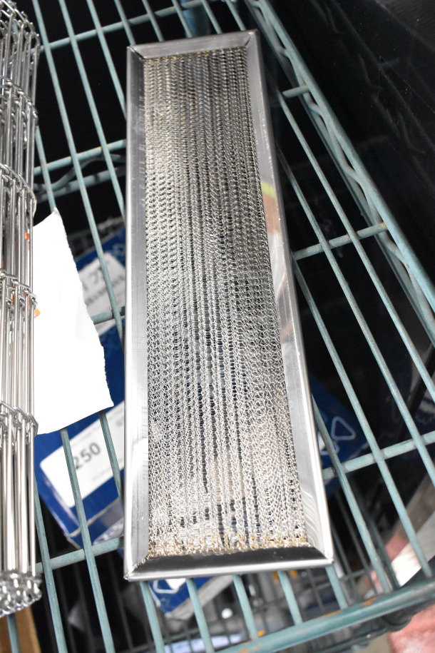 Brand new Alto-Shaam 5024003 Vector Air Filter for VMC Series, metal mesh design, some visible labels and boxes nearby.