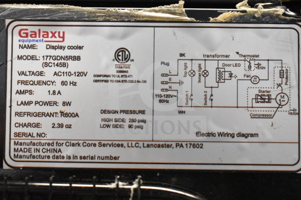 Galaxy 177GDN5RBB merchandiser refrigerator label, showing voltage, frequency, and refrigerant type. Missing door.
