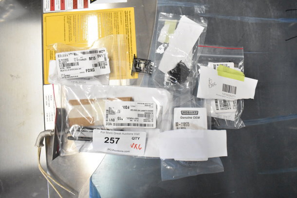 Brand new scratch and dent items including Hobart 00-118175 index dial assembly, Alto-Shaam kits, and more.