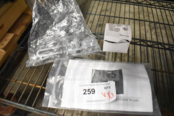 Three items including a shorting cap, Bosch manual in plastic, and a white box labeled S1009C control module.