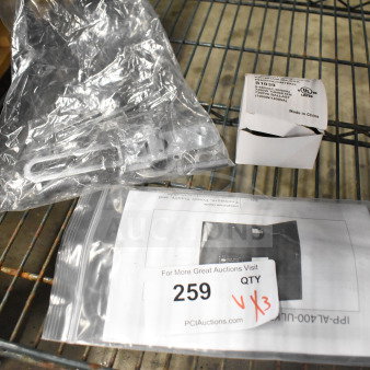 Three items including a shorting cap, Bosch manual in plastic, and a white box labeled S1009C control module.