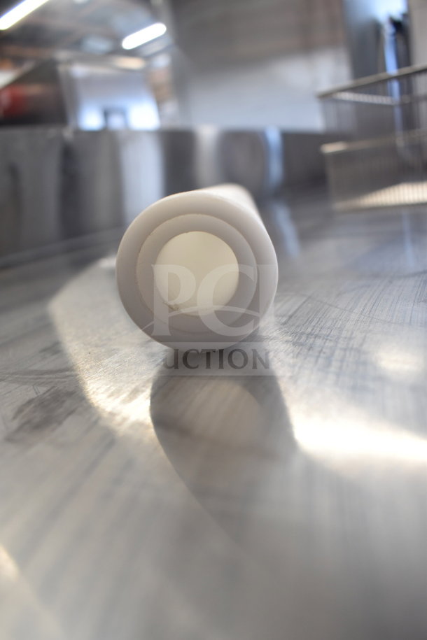 Brand new Estella 348PEDS45B outer upper roller for EDS18D dough sheeters. White, cylindrical design.