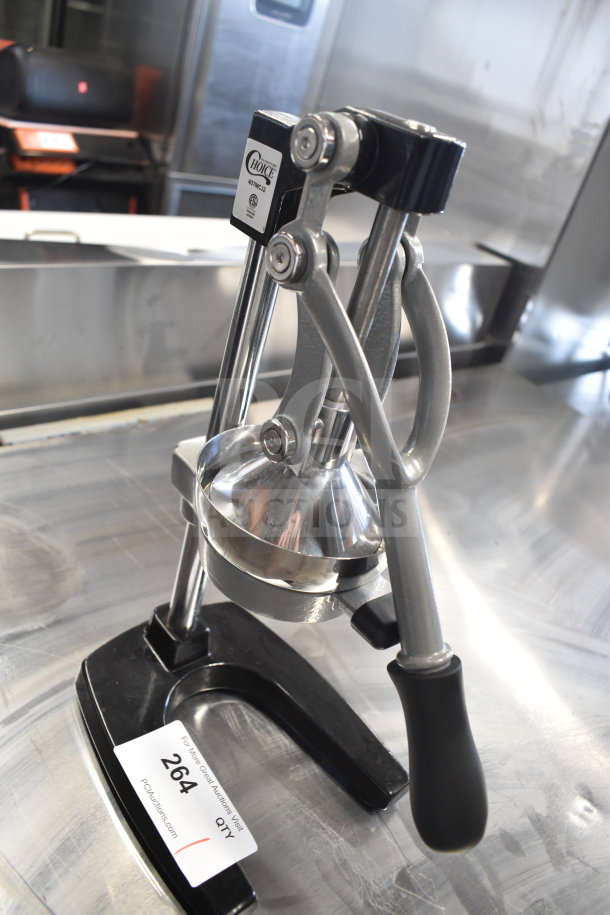 BRAND NEW Choice 407MCJ2 manual heavy-duty citrus juicer; chrome finish, black handle, visible tag indicates model.