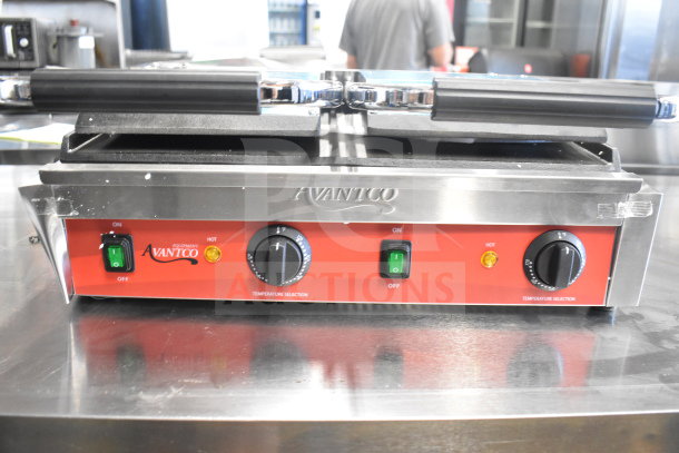 Brand new Avantco 177PG400S commercial dual panini grill, smooth plates, 19 5/8" x 9 1/8" surface, 120V, minor scratches.