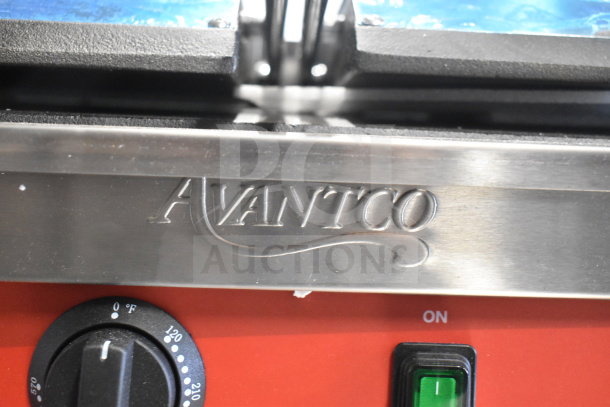 Avantco 177PG400S dual panini grill with smooth plates, features brand logo, temperature dial, and power switch. Scratch and dent condition.