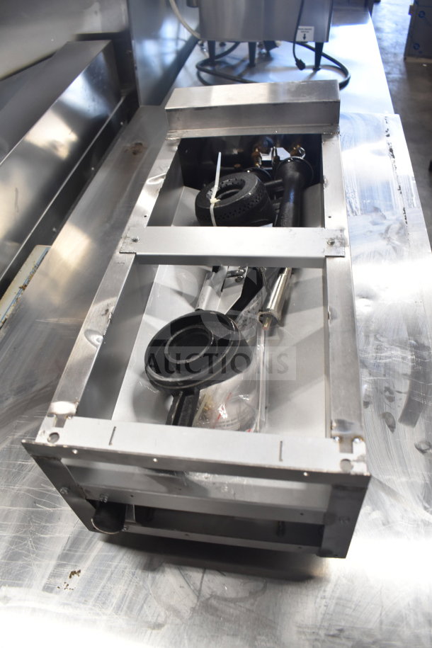 Brand new Vulcan VCRH12-1 12" 2 burner natural gas countertop range, 50,000 BTU, visible burners, minor scratches.