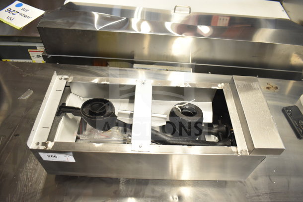 Brand new Vulcan VCRH12-1 natural gas 2 burner countertop range, 50,000 BTU, with visible scratches and dents. Labels display model and auction info.