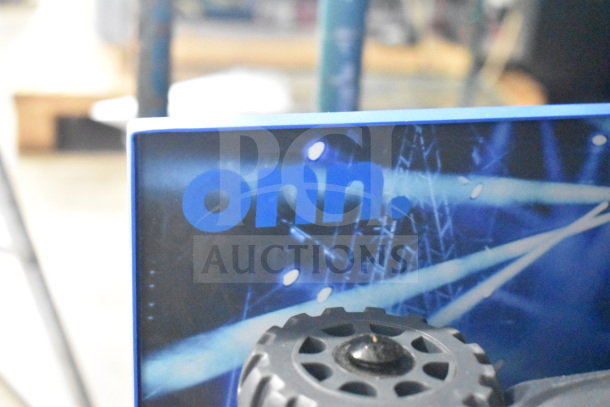 Onn store display with large party speaker, featuring brand logo and wheel detailing, used for promotional purposes.