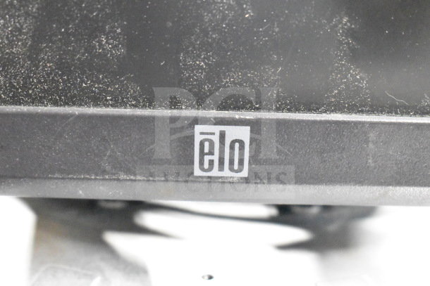 Six mixed-brand computer monitors, including Dell and HP, featuring visible Elo branding. Used condition; see dust marks.