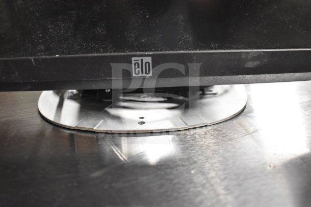 Six computer monitors including Dell and HP, shown with base. Some visible wear, featuring elo logo.