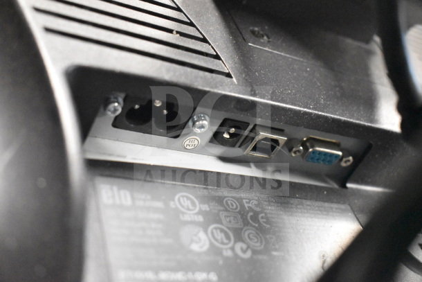 Ports and labels on the back of a Dell monitor, showing power, USB, and VGA connections, with "Hi Pot" marking.