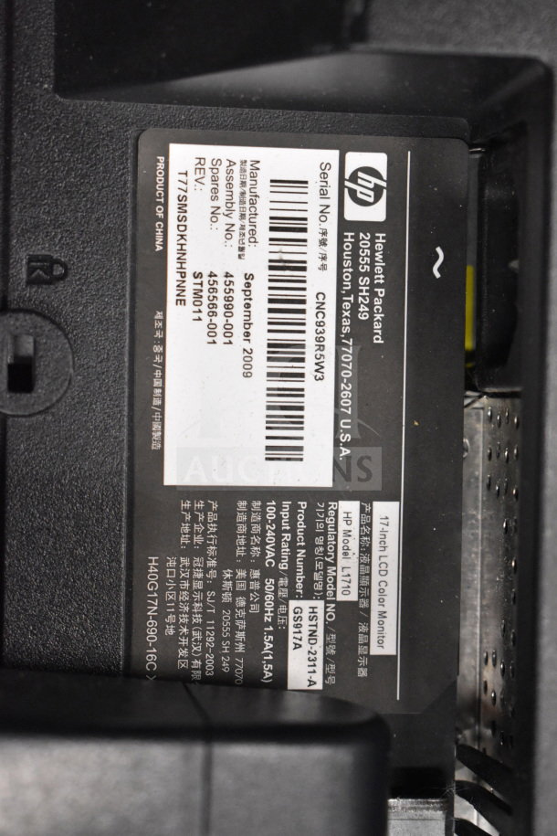 Label close-up of an HP 17-inch LCD color monitor, model L1710, serial CNC938R5W3, manufactured in September 2009.