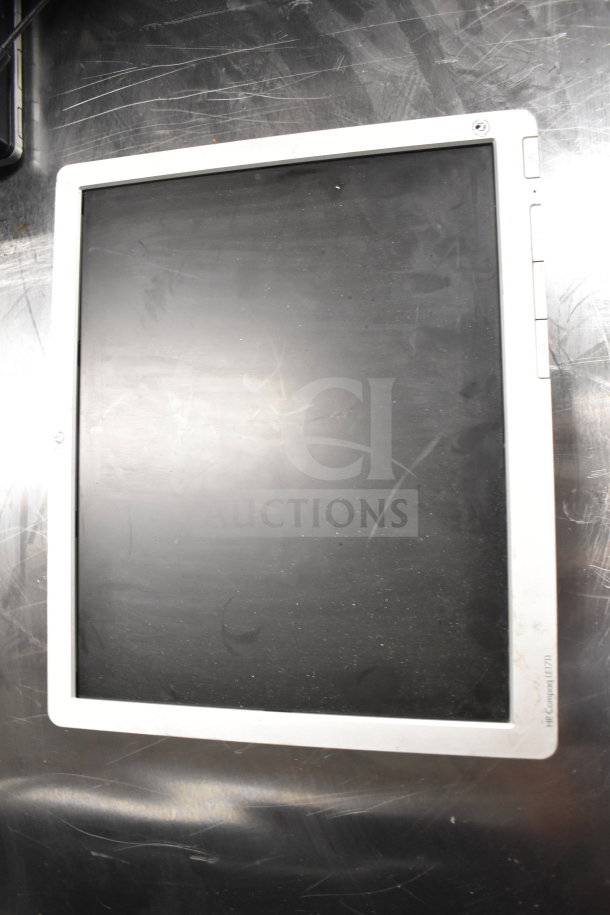 Six assorted computer monitors, including Dell and HP, available in a single auction lot. Some wear visible on screens.