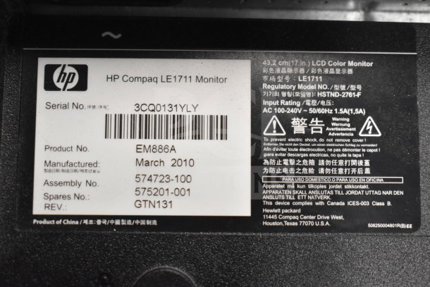 HP Compaq LE1711 Monitor label showing serial number 3CQ0131YLY, manufactured March 2010, model HSTND-2761-F.