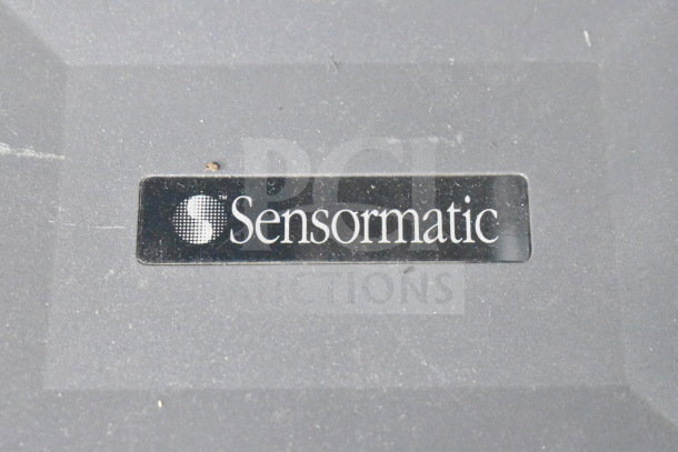 Sensormatic ZBSMPROE Antenna Deactivator. Black label with Sensormatic logo. Lightly scratched surface.