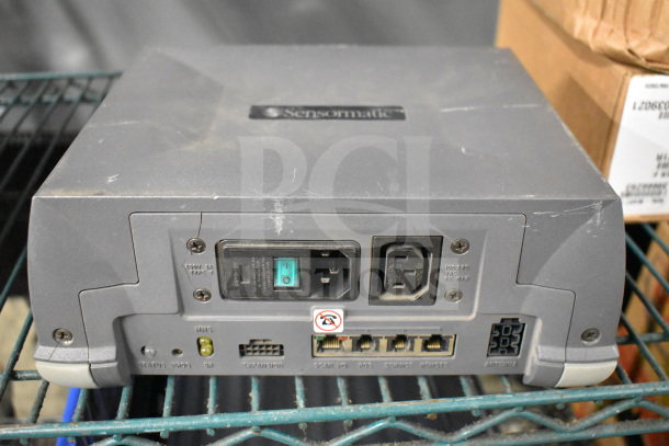 Sensormatic ZBSMPROE Antenna Deactivator, gray, visible power switches and ports. Slightly used condition.