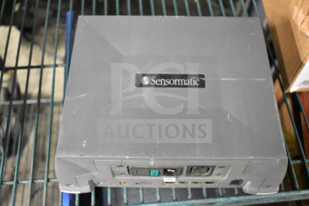 Sensormatic ZBSMPROE Antenna Deactivator; visible logo; used condition; features activation switch and ports.