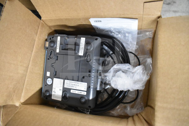 Ingenico ISC250 credit card reader in box, includes cables and documents, new condition, multiple visible labels and serials.