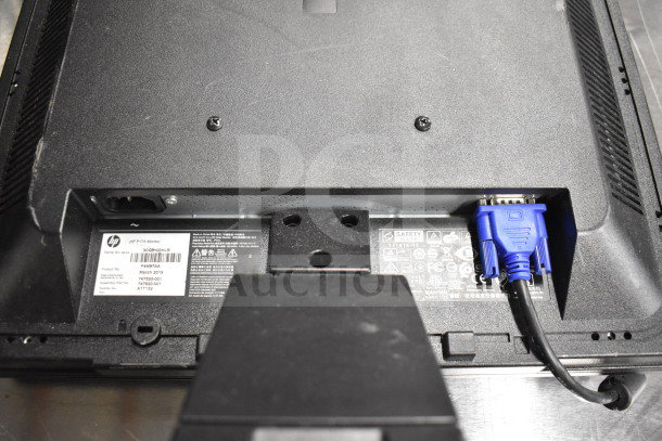 Back of HP monitor with visible labels and VGA connector. Model P17A. Part No. 747233-001.