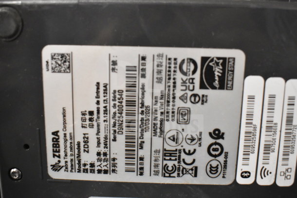 Zebra ZD621 Desktop Direct Thermal Barcode Printer label with model and serial number details, certifications, and compliance marks.