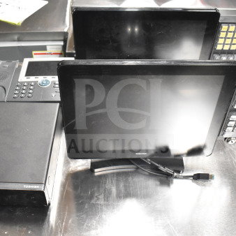 Auction items: Toshiba monitors, corded office telephone, and receipt printers. Includes multiple items for bidding.