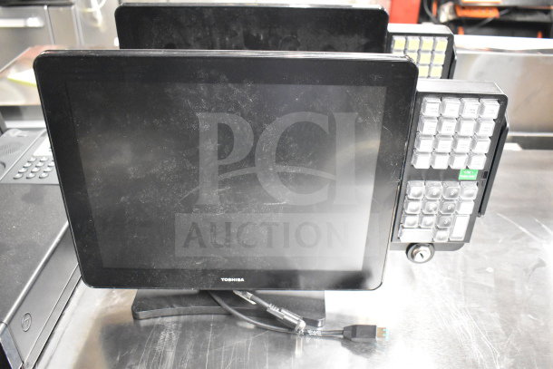 Toshiba monitor with attached numeric keypad in fair condition, part of auction lot with office electronics.