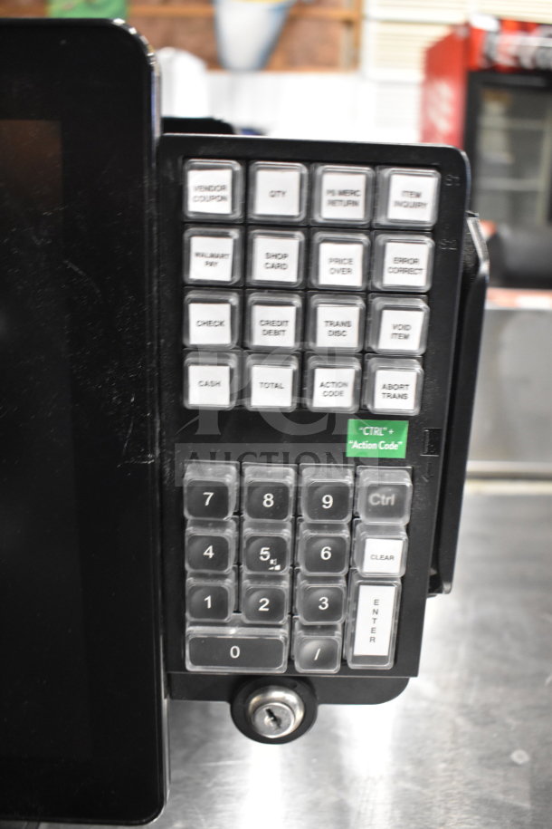 Office telephone keypad with various function buttons, including numeric keypad and action code instructions, in good condition.