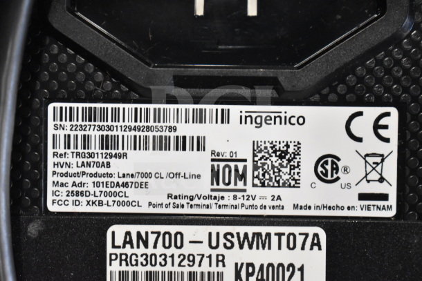 Label on Ingenico Lane/7000 CL device, shows serial number, product details, voltage rating, and country of manufacture.