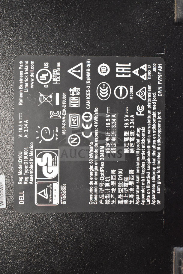 Label on Dell device, model OptiPlex 3040M, 19.5V, 3.34A, assembled in Mexico. Includes CE, UL, and FCC certifications.