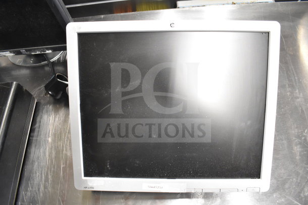 HP L1710 monitor, black screen, light wear. Includes 15 items: Toshiba monitors, office phone, receipt printers.