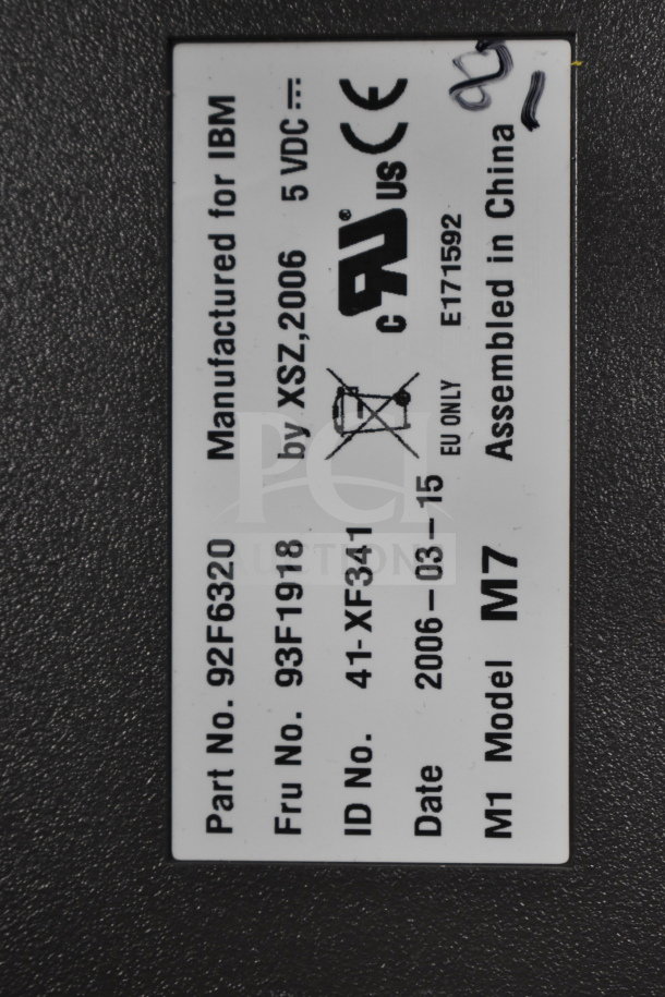 Label on electronic item showing part no. 92F6320, model M7, manufactured for IBM, assembled in China, dated 2006-03-15.
