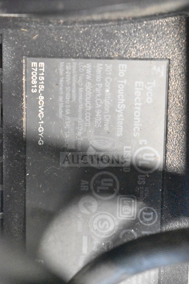 Label close-up on a Tyco Electronics device, model ET1515L-8CWC-1-GY-G. Includes UL certification marks.