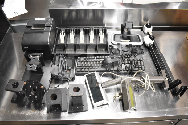 15 items including Epson receipt printer, keyboard, credit card reader, cash drawer insert. Multiplies bid by 15.