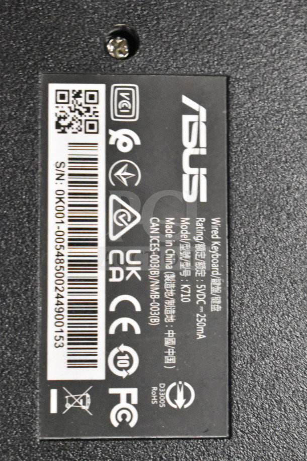 ASUS keyboard label, model K710, 5VDC, 250mA, made in China, with compliance markings and serial number visible.