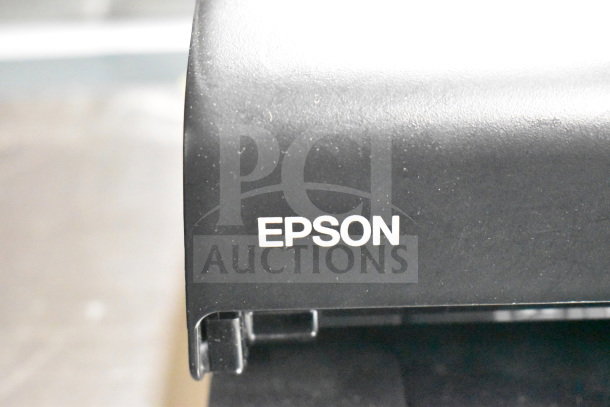Epson receipt printer, black, part of a lot including keyboard, credit card reader, and cash drawer insert. 15 items in total.