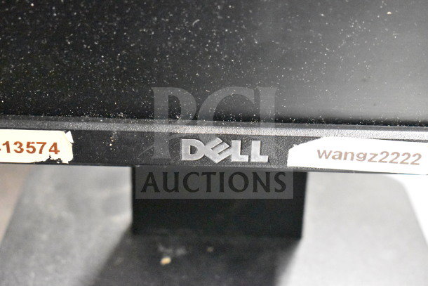 Dell monitor with visible labels "13574" and "wangz2222" on bezel. Part of auction lot with 15 tech items.