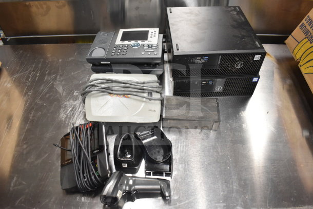 12 mixed items including Dell computer towers, corded office phones, credit card reader, cables. Auction lot, good condition.