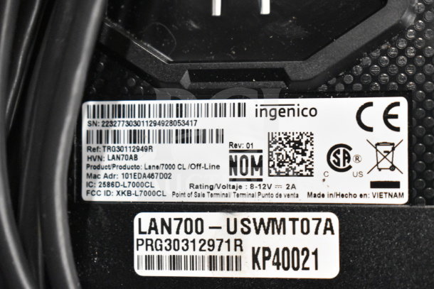 Label showing Ingenico credit card reader model Lane/7000 CL, voltage 8-12V, made in Vietnam.