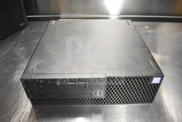 Dell computer tower, black casing, visible USB ports, moderate wear. Includes office phones and card reader, 12-item lot.