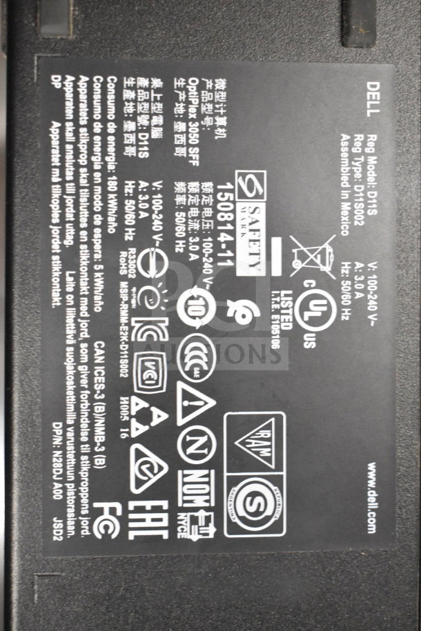 Dell computer tower model D11S label showing specifications; voltage 100-240V, current 3.0A, frequency 50/60Hz.