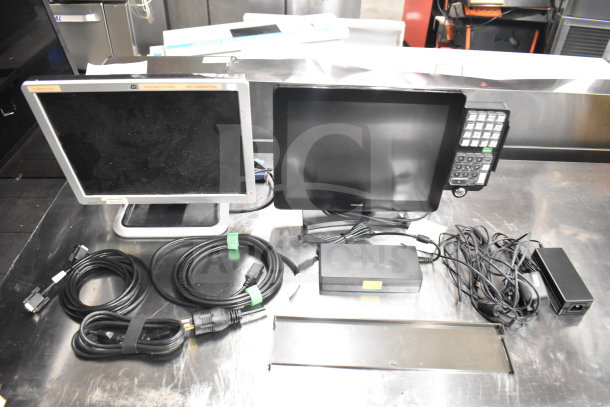 12 electronic items including Dell computer towers, corded office phones, Toshiba display, credit card reader, cords. 12 times your bid.